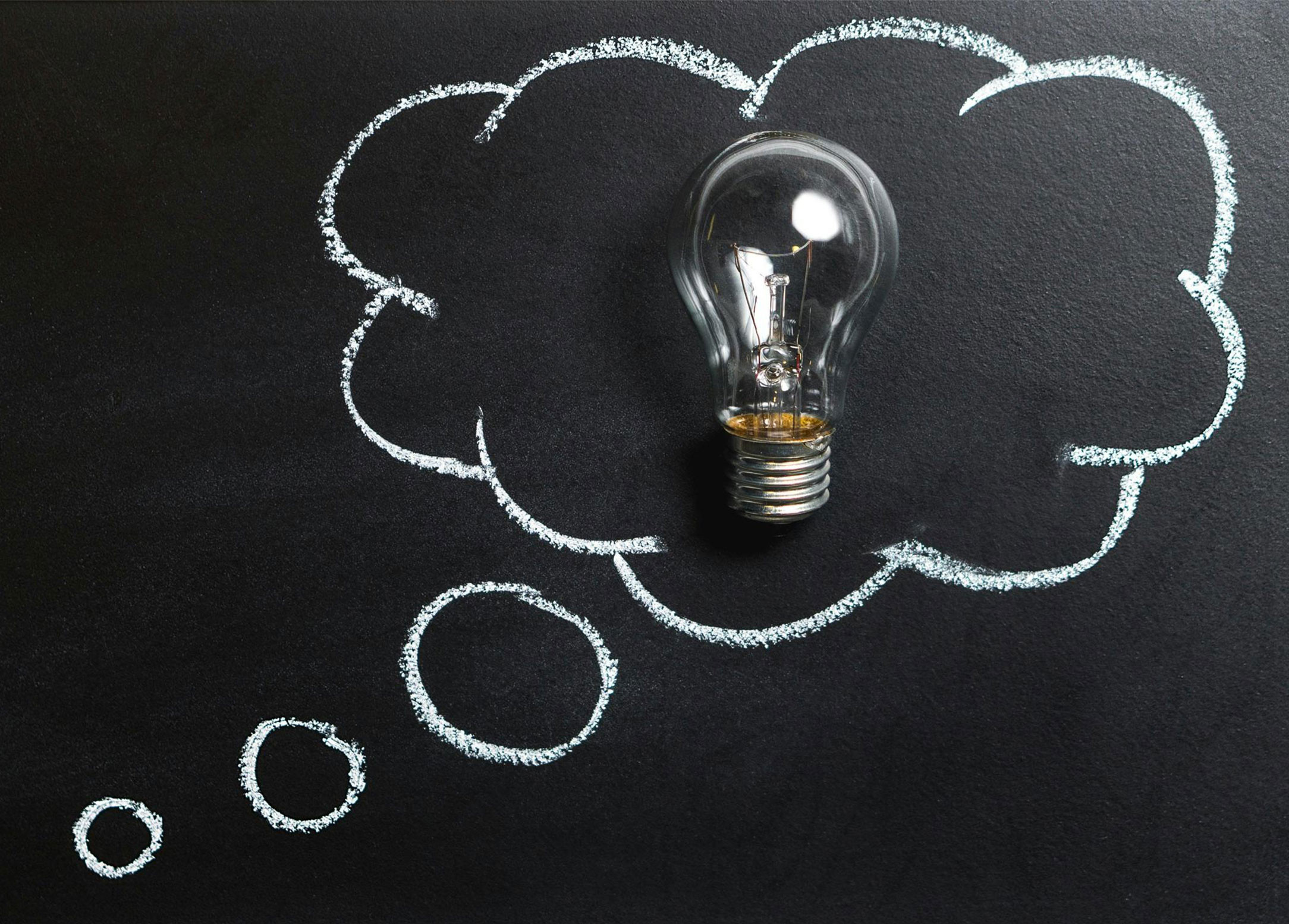 Light bulb in a thought bubble introducing a problem solving course.